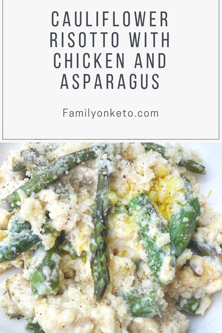Picture of keto cauli risotto with asparagus and chicken meat in a plate, sprinkled with parmigiano and olive oil