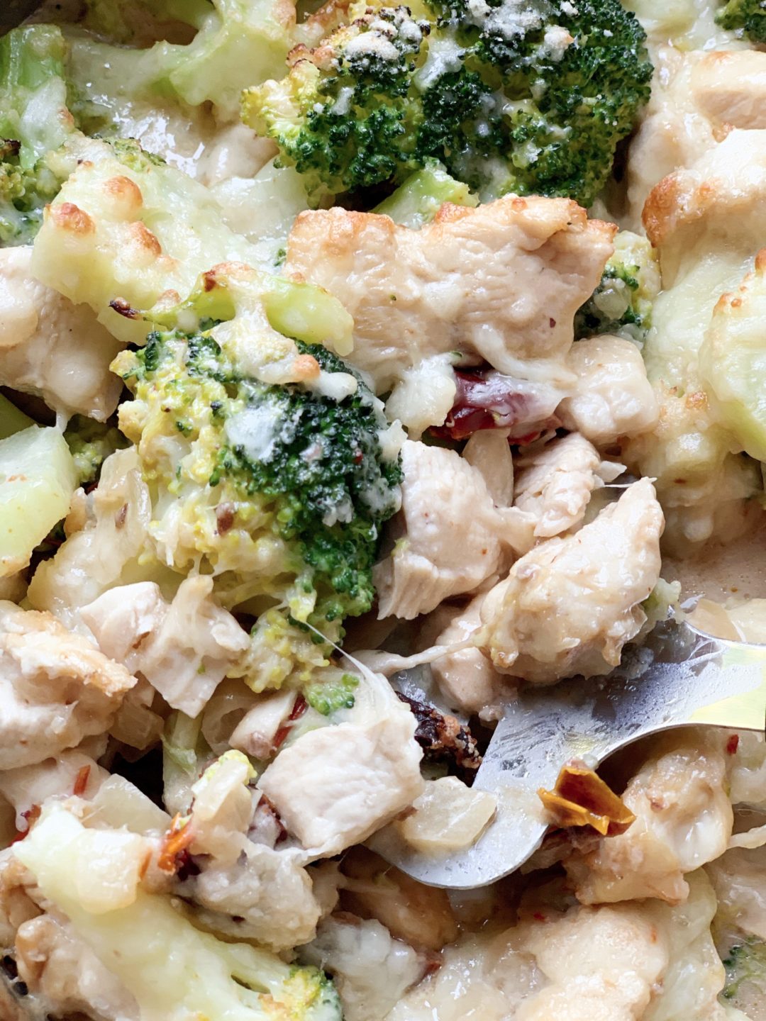 Keto chicken and broccoli casserole with sun dried tomato sauce