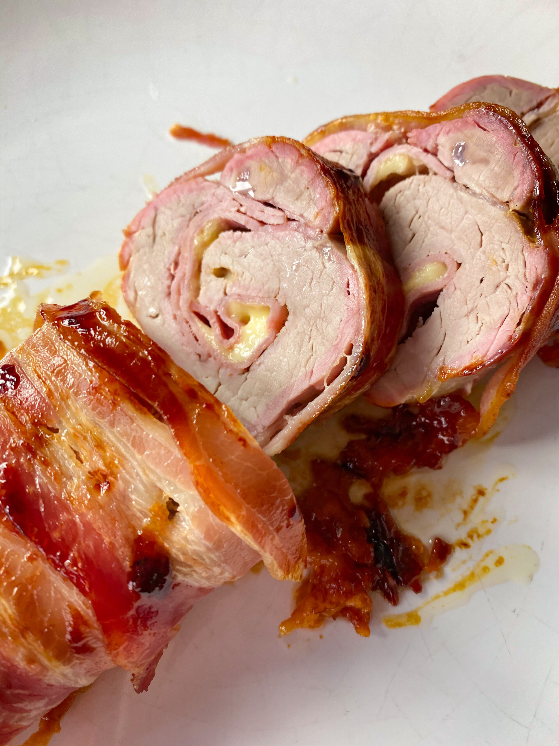 Bacon wrapped stuffed pork tenderloin - Family On Keto